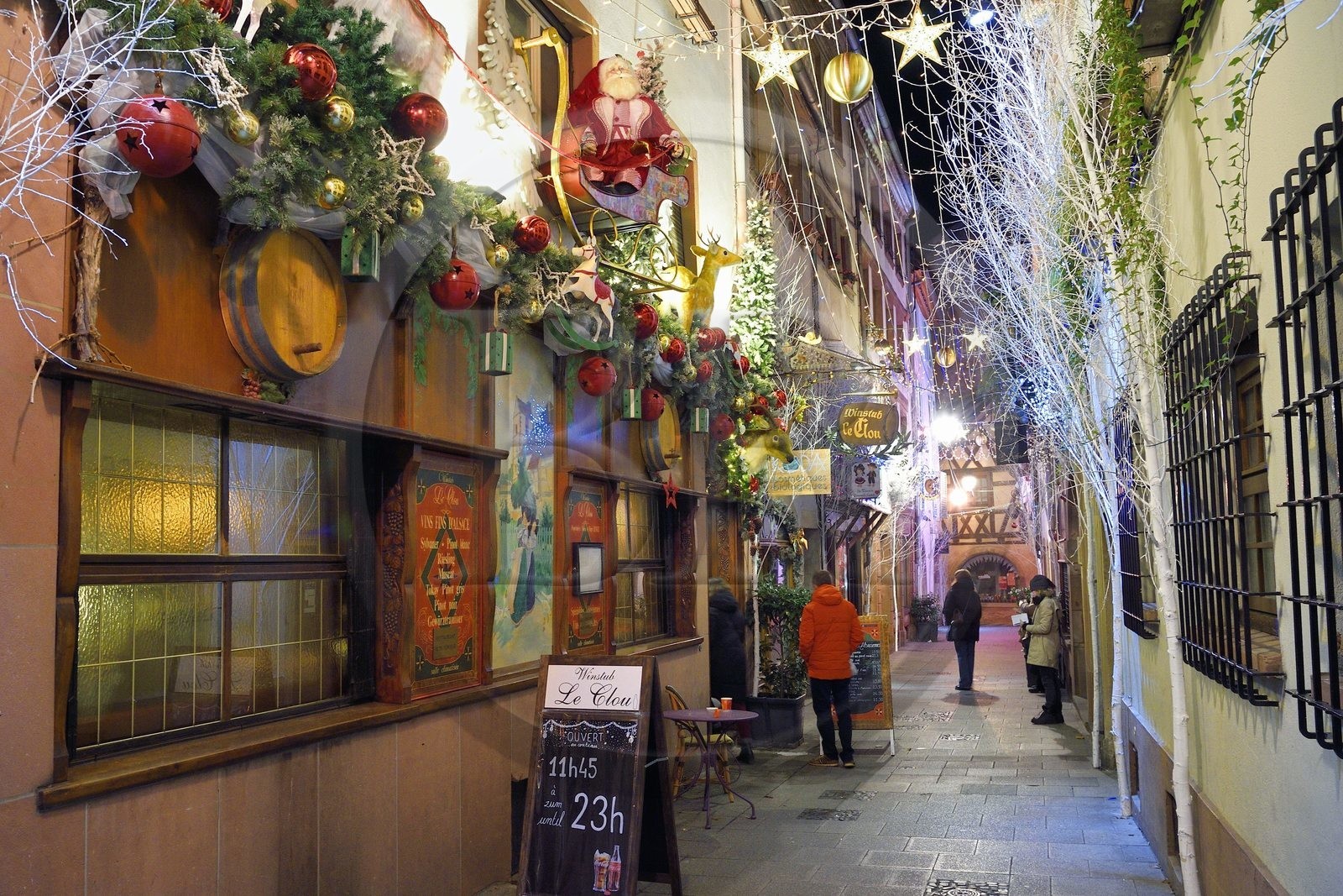 France, Bas Rhin, Strasbourg, old town listed as World Heritage by UNESCO, the winstub Le Clou in the rue du Chaudron with its Christmas decorations