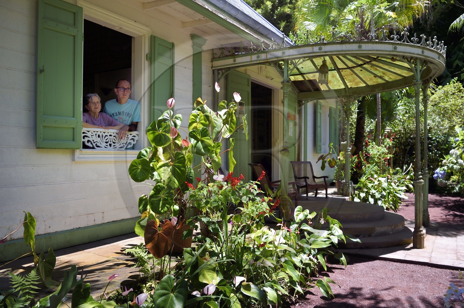 France, Ile de la Reunion, Cirque de Salazie, classé Patrimoine Mondial de l'UNESCO, Hell-Bourg, labellisé les Plus Beaux Villages de France, la Villa ou Maison Folio à l'architecture créole traditionnelle du XIXème siècle, Solange Folio et son fils Jean François Folio