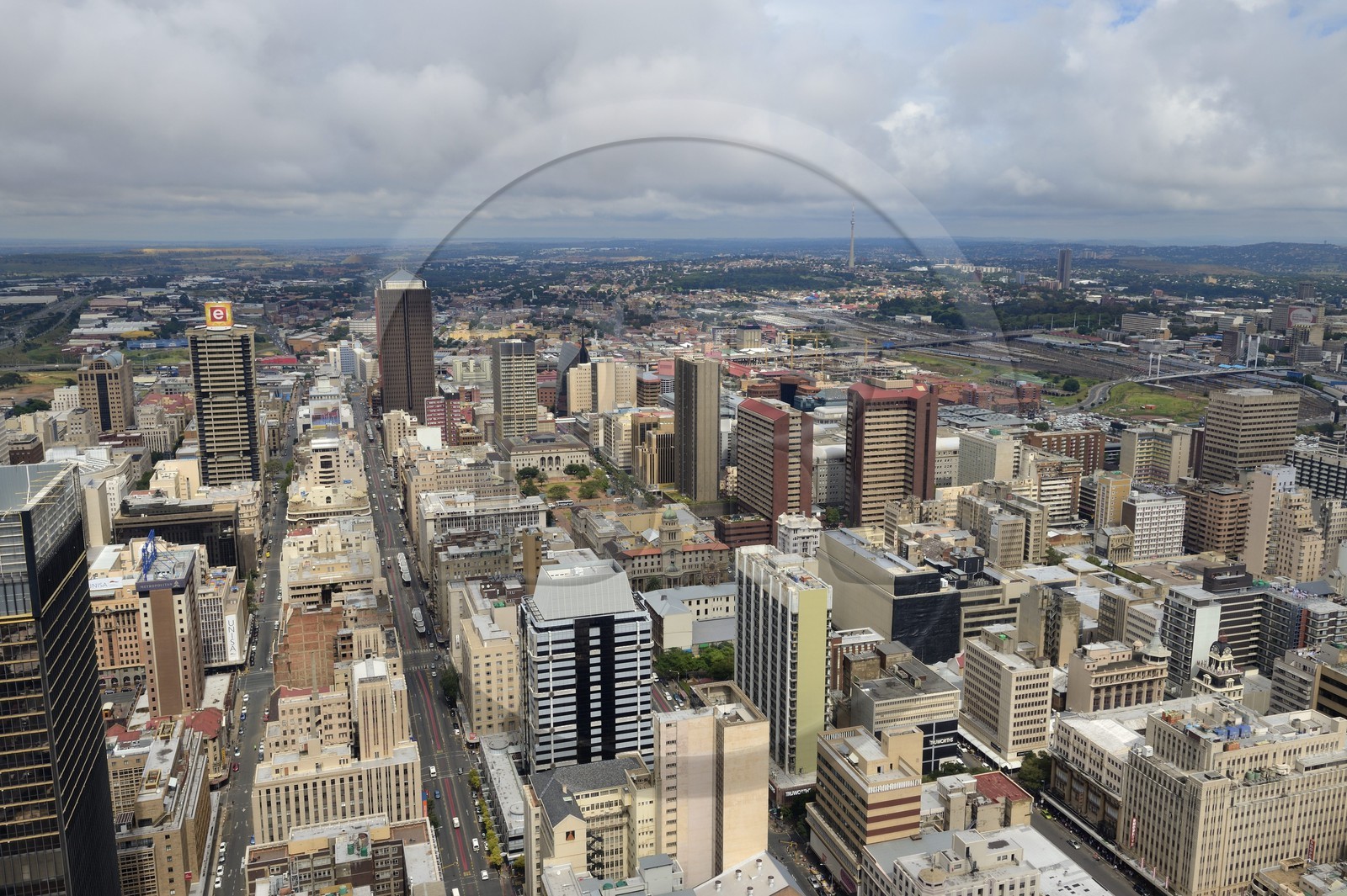 South Africa, Gauteng Province, Johannesburg, CBD (Central Business District), downtown view from the Carlton Center tower with gold mine's spoil tip of Soweto left and Nelson Mandela Bridge right in the background