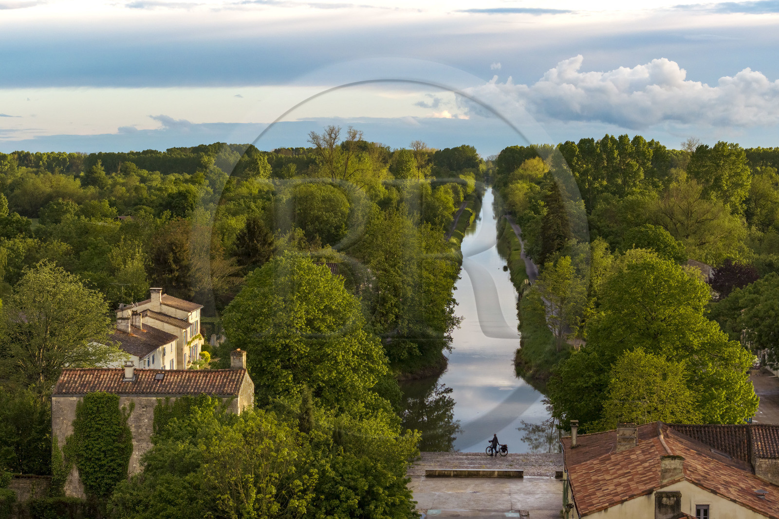France, Vendee, Bouillé Courdault, the river port of Courdault at the end of the Vieille-Autise canal, silhouette of a cyclist on the Vendée Vélo Tour cycle route (aerial view)