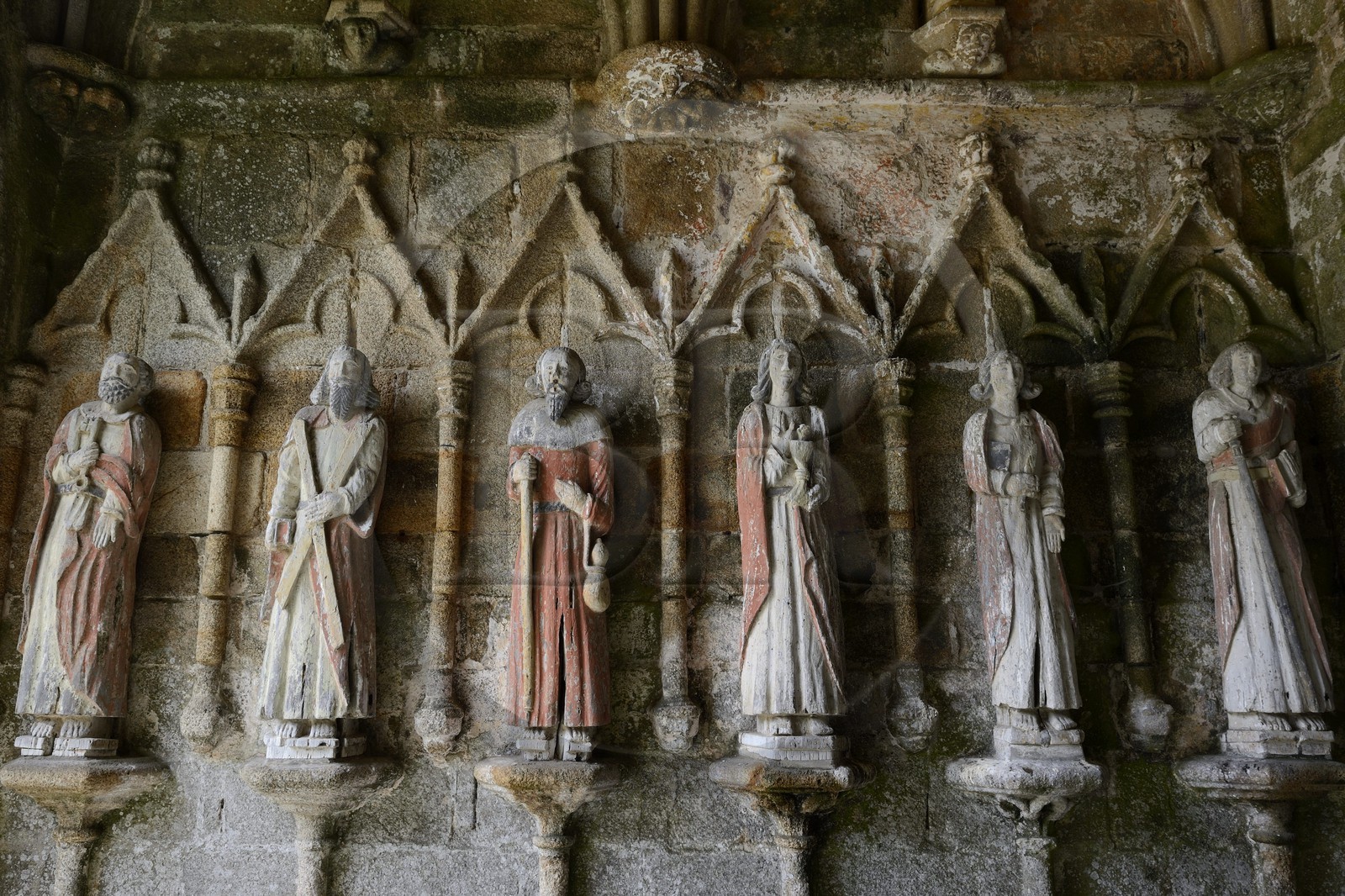 France, Cotes-d'Armor, Plouha, Kermaria an Iskuit chapel, polychrome wooden statues of the twelve apostles under the porch