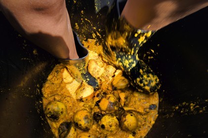 France, Reunion island (French overseas department), La Saline, La Part des Anges Distillation, crushing at the foot of the mangoes before fermentation of the resulting juice