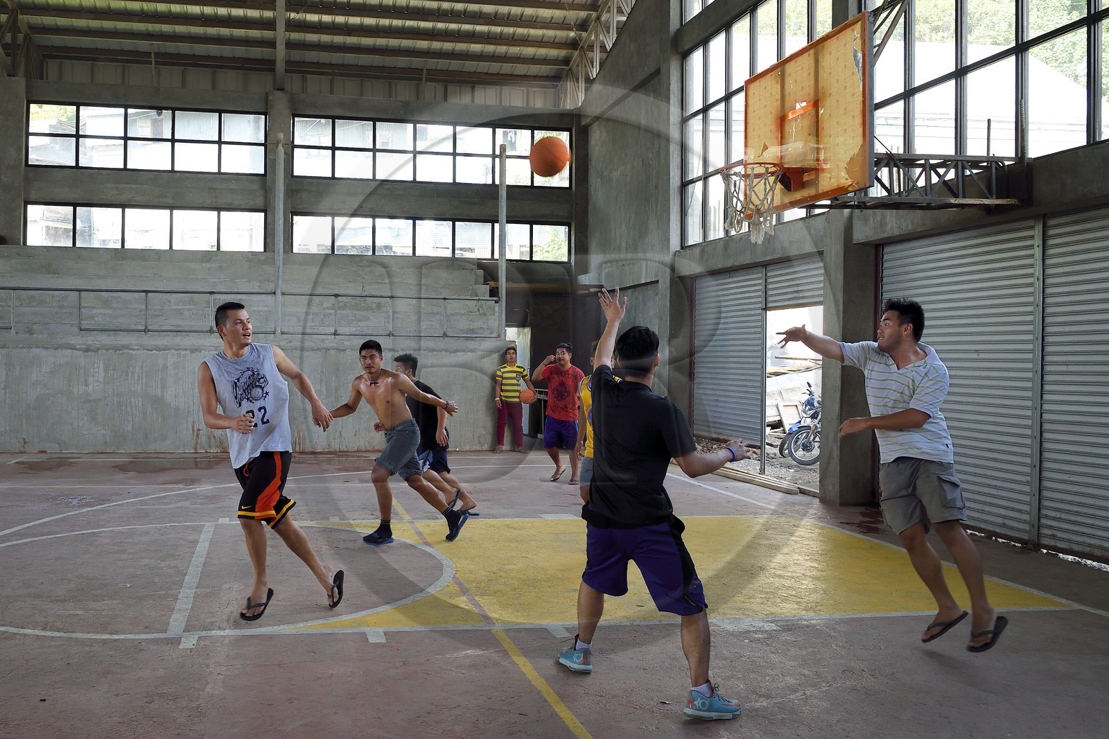 Philippines, Ifugao province, Banaue town, young people playing very popular basketball in the sports hall