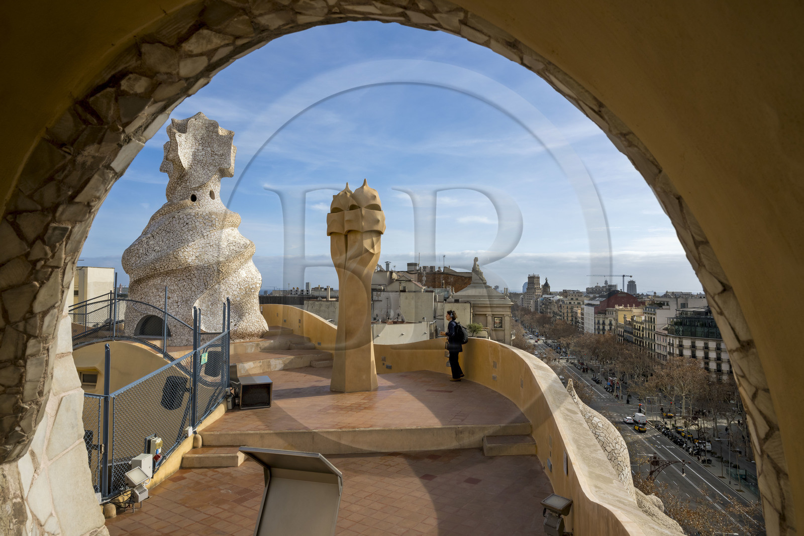 Spain, Catalonia, Barcelona, Eixample district, Passeig de Gracia to the right below, Pedrera or Casa Mila (1905-1910) by the Catalan modernist architect Antoni Gaudi, UNESCO World Heritage site, chimneys and ventilation towers on the roof terrace of the building
