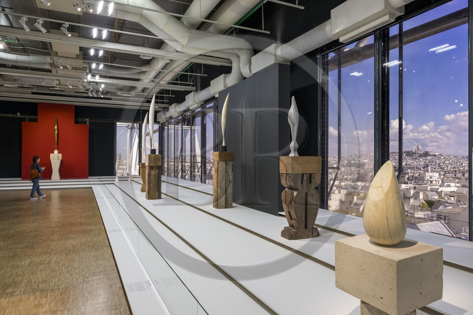 France, Paris, Les Halles district, the Pompidou Center also called Beaubourg, National Museum of Modern Art (MNAM), Brancusi retrospective exhibition, L'Envol, sculptures from the Birds in Space series, in the background the Sacré-Coeur basilica on the Butte Montmartre