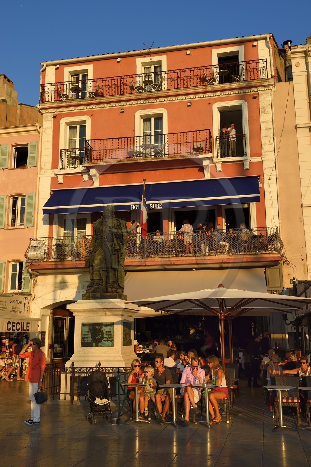 France, Var, Saint-Tropez, statue of vice-admiral Suffren and façade of the Sube hotel on Suffren wharf