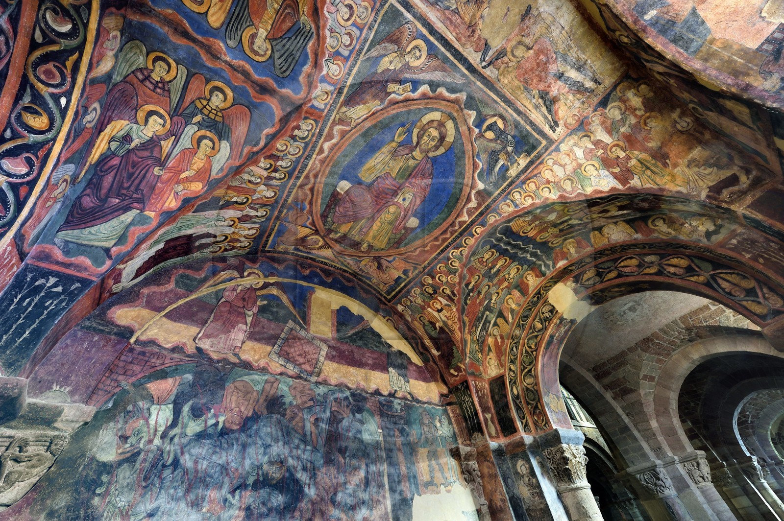 France, Haute Loire, Brioude, the Basilica of Saint-Julien de Brioude in Auvergne Romanesque style, 13th century frescoes in the Saint Michel chapel, Christ in glory is surrounded by the four evangelists, angels and saints, down representation of hell with demons taking souls