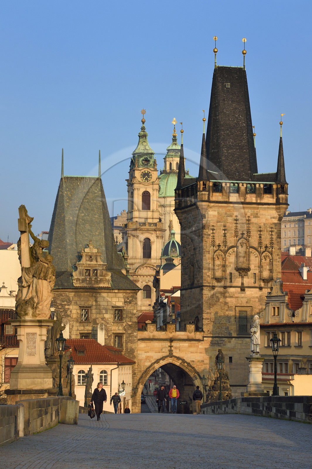 Czech Republic, Prague, historical centre listed as World Heritage by UNESCO, the Charles Bridge over Vltava River, the Gothic tower at the entrance of the bridge on the side of Mala Strana district and Saint Nicolas Church
