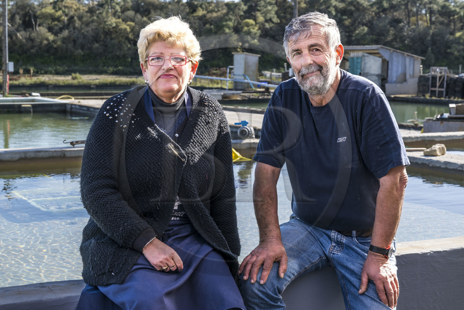 France, Vendée (85), Talmont Saint Hilaire, port of the oyster farming village of La Guittière in the Payré estuary, oyster farmer Patrick Guyau and his wife
