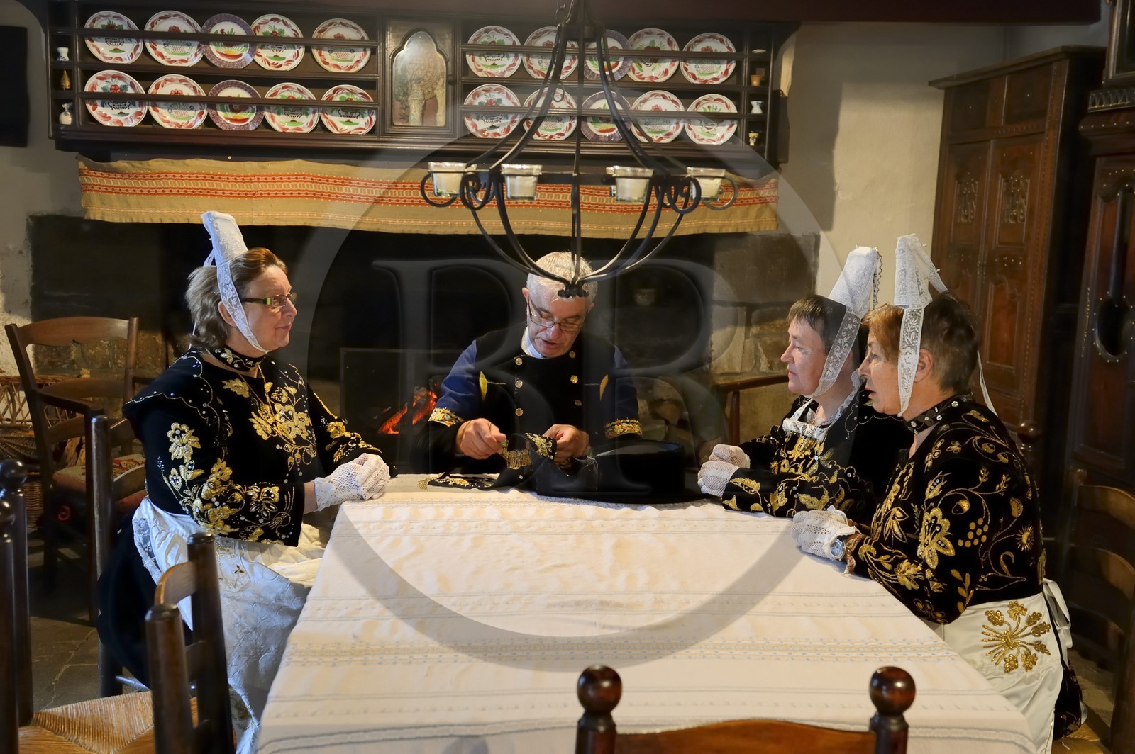 France, Finistere, Locronan, labelled Les plus Beaux Villages de France (The Most Beautiful Villages of France), adjustment of the traditional costumes the morning of the procession of the small Troménie in the Louboutin family farm