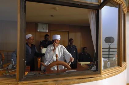 Egypt, Upper Egypt, Nubia, Lake Nasser, lake cruise on Qasr Ibrim ship, the cockpit and the captain