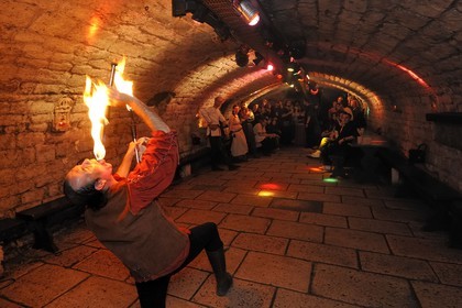 France, Paris, the Saint-Sabin cellars, medieval tavern, fire-eater