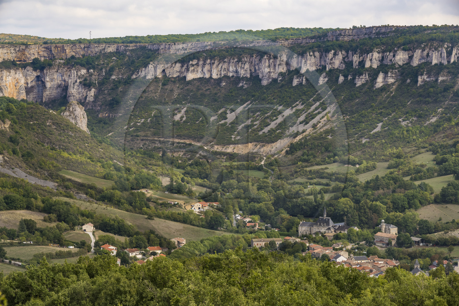 France, Aveyron, Grands-Causses Regional Nature Park, the village of Tournemire in the cirque at the foot of the Causse du Larzac