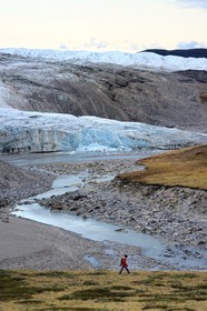 Greenland, central western region towards Kangerlussuaq bay, Isunngua highland, the Reindeer glacier (part of the Russell Glacier) at the edge of the ice cap and located within the UNESCO World Heritage site of Aasivissuit - Nipisat and hiker