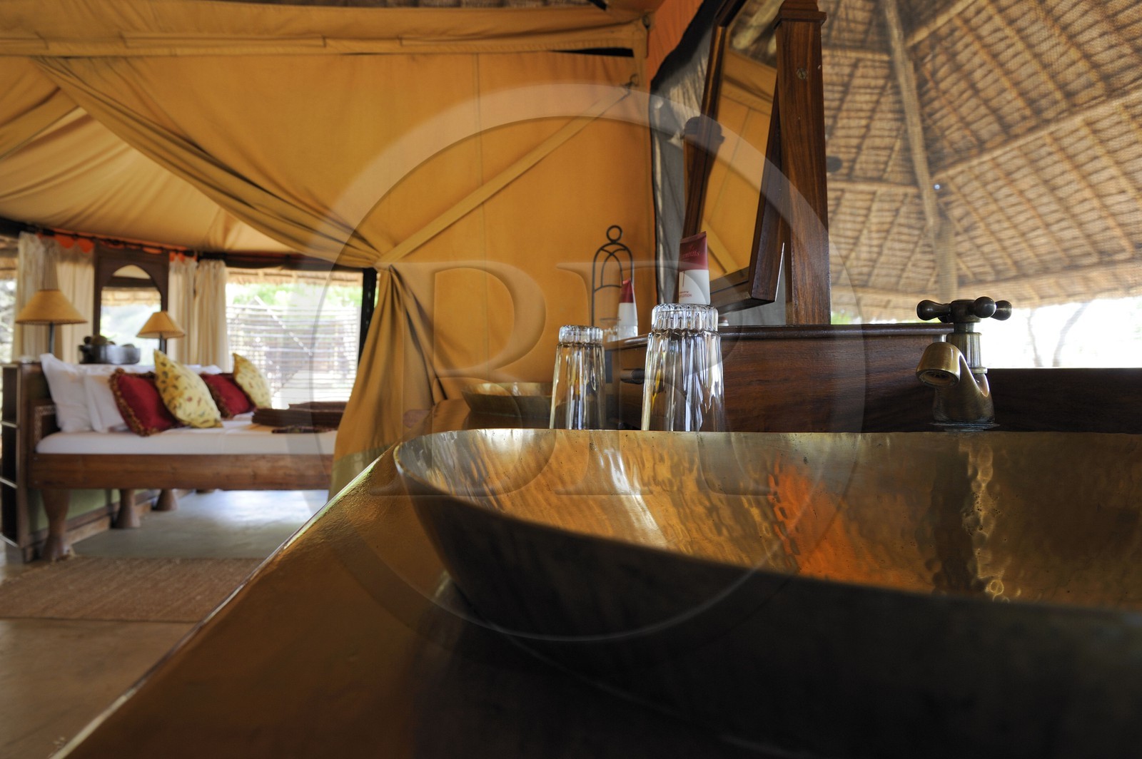 Tanzania, Selous Game Reserve is one of the largest fauna reserves of the world and designated a UNESCO World Heritage Site in 1982, the very exclusive Selous Camp, one of the 13 vast luxury tents raised onto wooden platforms with palm canopies