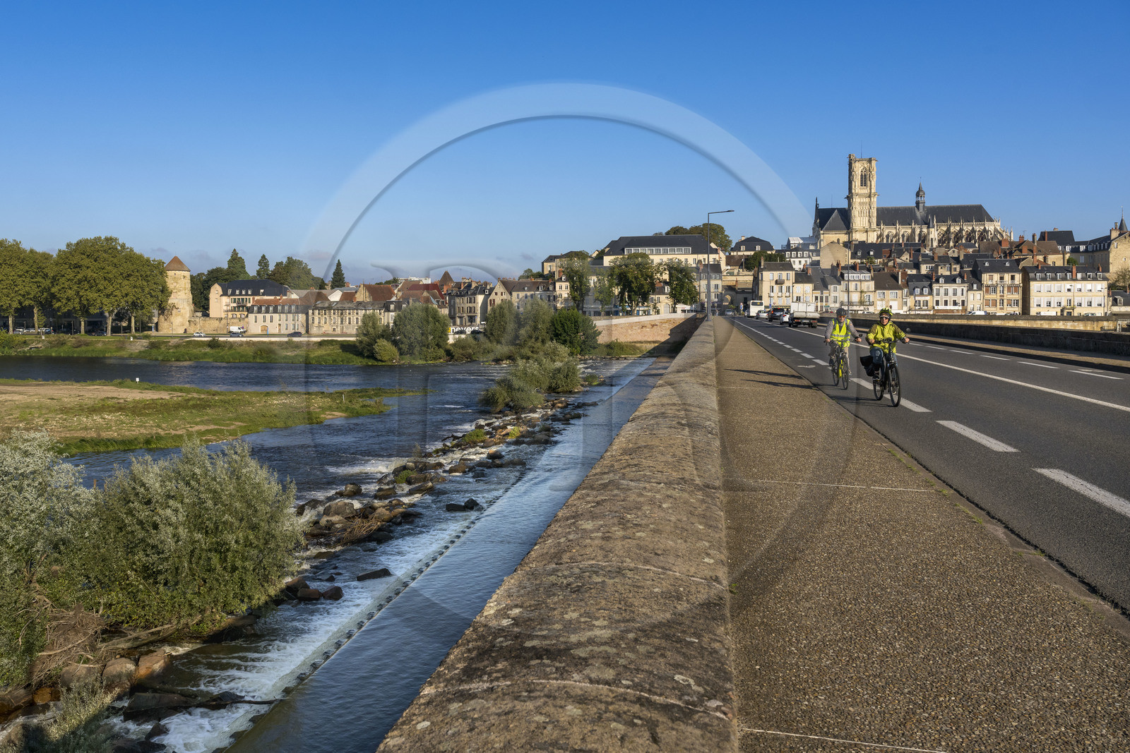 France, Nièvre, Nevers, Pont de la Loire, bridge over the Loire river, with the Saint-Cyr-et-Sainte-Julitte cathedral in the background