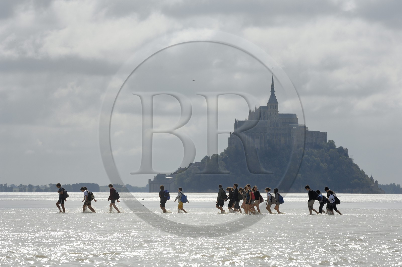 France, Manche, crossing on foot the Bay of Mont Saint Michel, listed as World Heritage by UNESCO