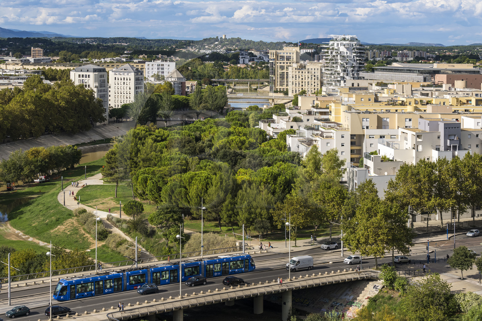 France, Herault, Montpellier, Richter district, the banks of the Lez river, the Hotel de Région by Catalan architect Ricardo Bofill and the L'Arbre Blanc building by Japanese architect Sou Fujimoto in the background right