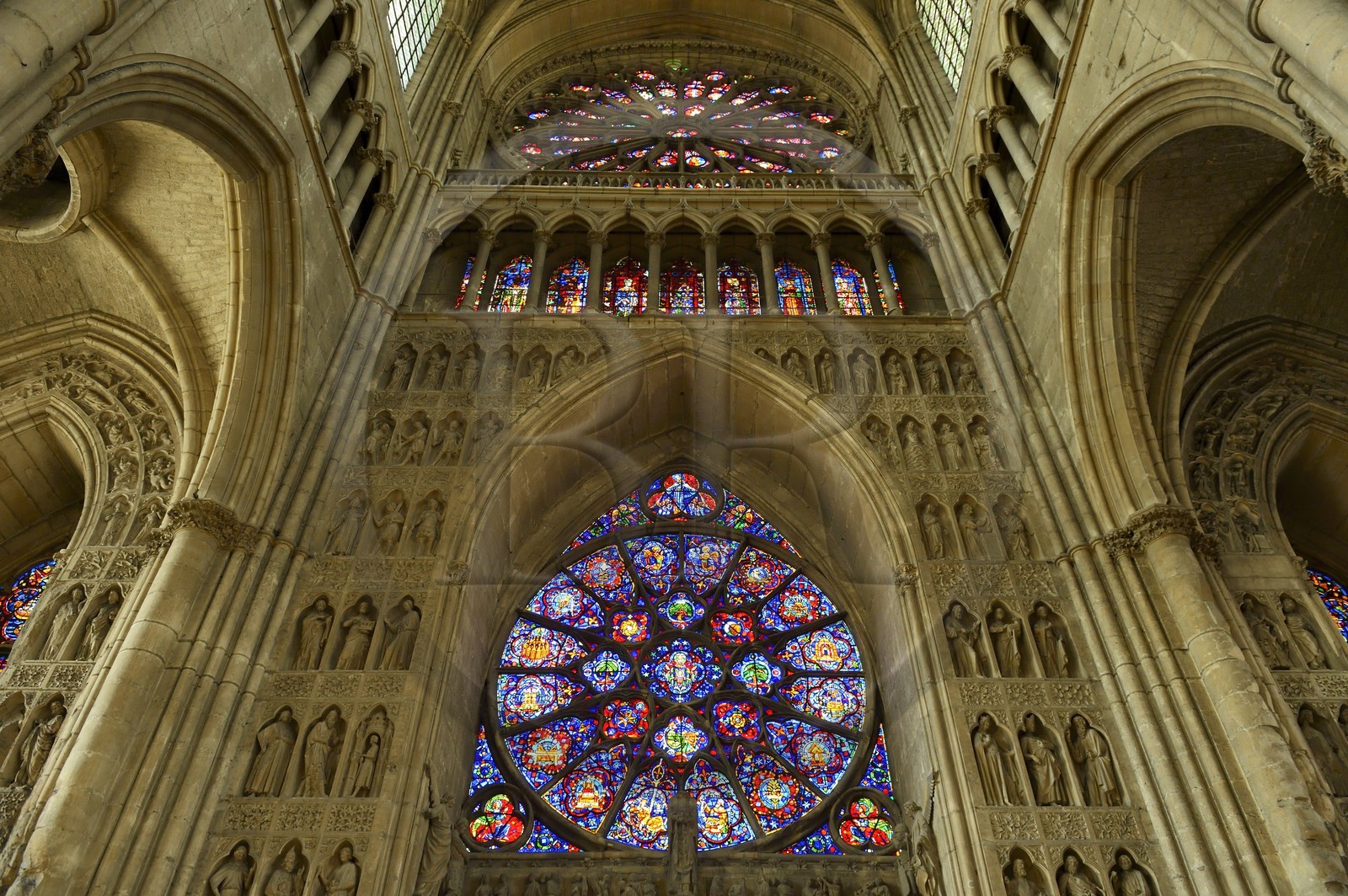 France, Marne, Reims, Notre-Dame de Reims cathedral, listed as World Heritage by UNESCO, Royal Portal, the central portal Reverse and the western facade rose window