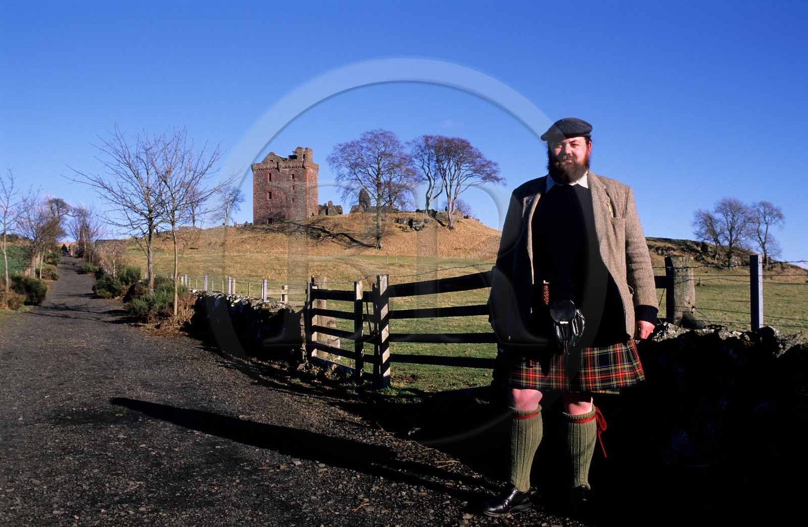 United Kingdom, Scotland, Perthshire and Kinross, Balvaird Castle and its owner wearing a kilt