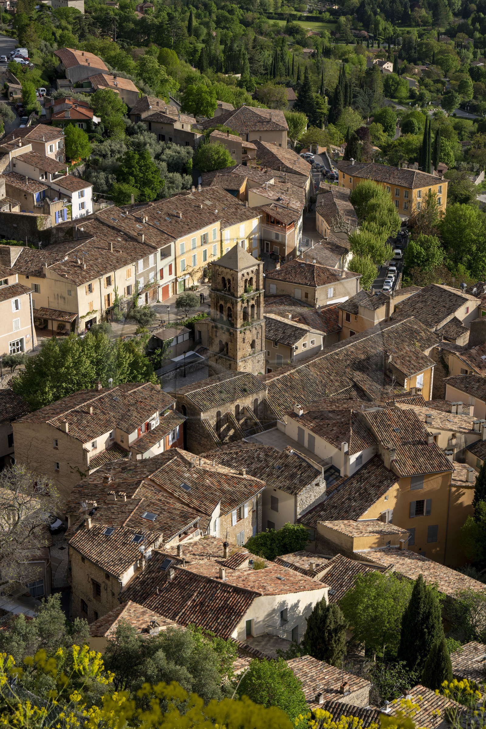 France, Alpes de Haute Provence, Parc Naturel Régional du Verdon, village of Moustiers Sainte Marie, labelled Les Plus Beaux Villages de France (The Most Beautiful Villages of France), the Notre-Dame-de-l'Assomption church with its 12th century bell tower
