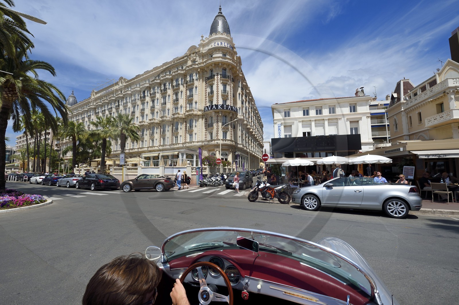 France, Alpes-Maritimes, Cannes, the Carlton palace on the boulevard de la Croisette, aboard a collection convertible Porsche Speedster 356