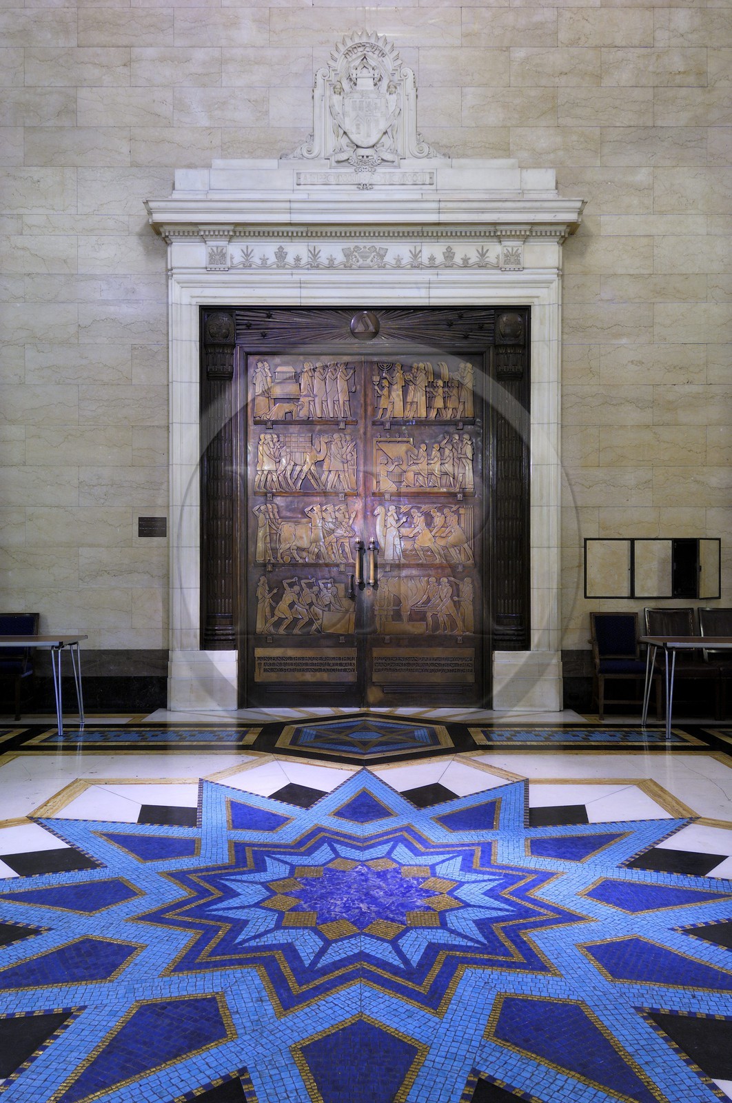 United Kingdom, London, United Grand Lodge of England, sculpted bronze door and mosaic on the ground