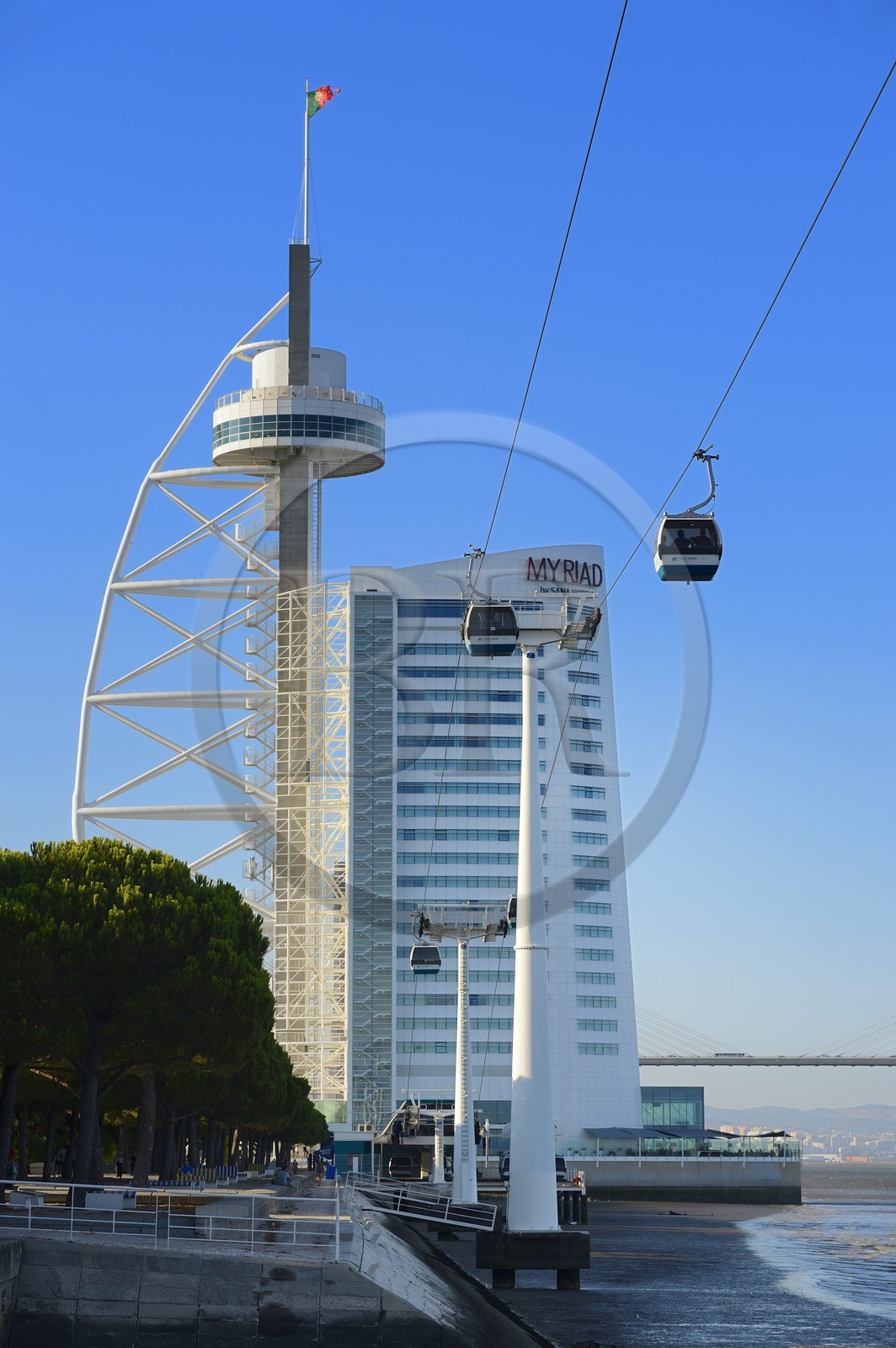 Portugal, Lisbon, Parque das Nações (Nations' Park) built for the Universal Expo 98 World Exhibition, Vasco de Gama Tower hosting the hotel Myriad by SANA Hotels and cable cars running along the Tagus