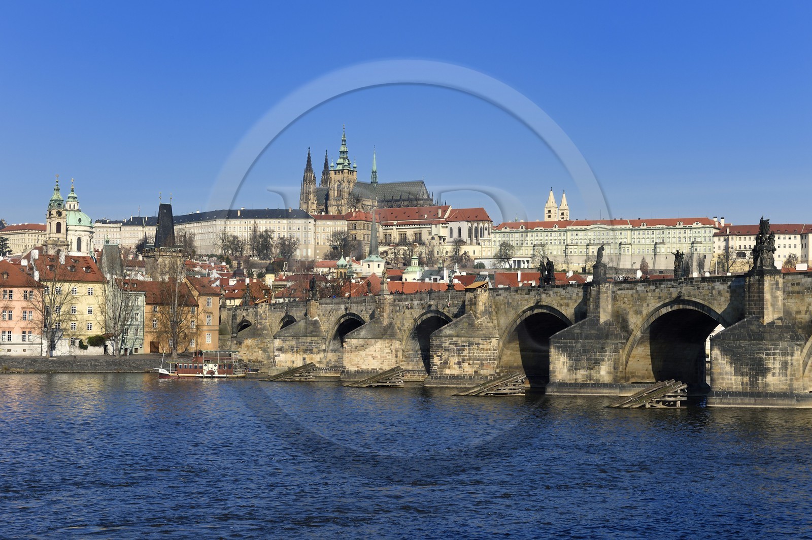 Czech Republic, Prague, historical centre listed as World Heritage by UNESCO, the Charles Bridge over Vltava River and St. Vitus cathedral overlooking the Royal Castle in the background