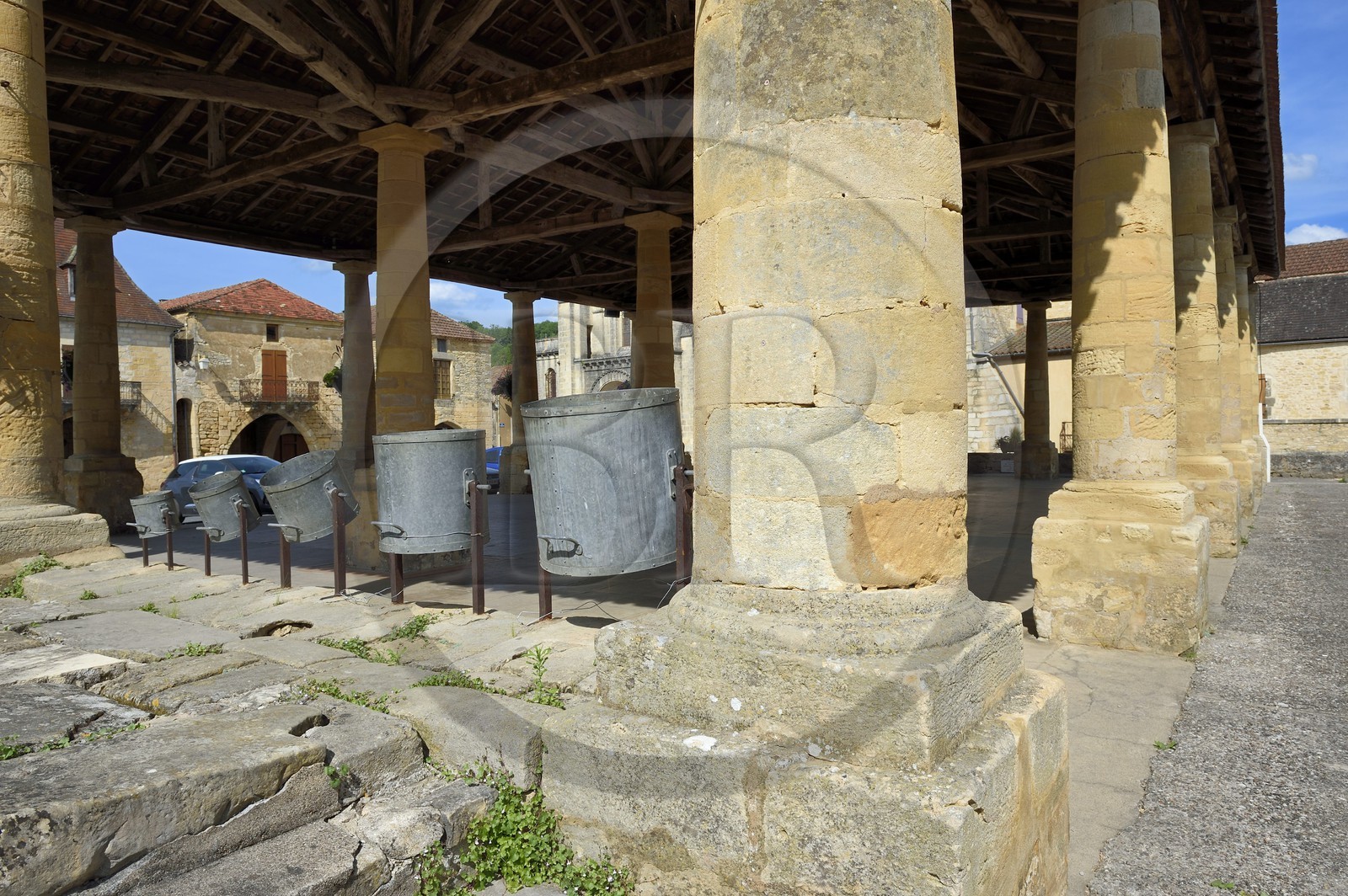 France, Dordogne, Perigord Noir, Villefranche du Perigord, the covered market with its Tuscan columns and its grain measures