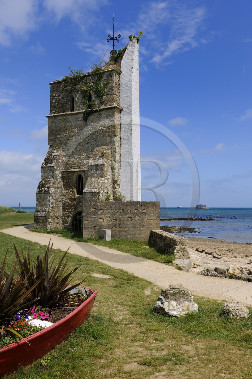 United Kingdom, England, Hampshire, Isle of Wight, Bembridge, remains of St. Helen's church (12th century) and the No Man's Land Fort in the background that was built between 1867 and 1880 to protect Portsmouth