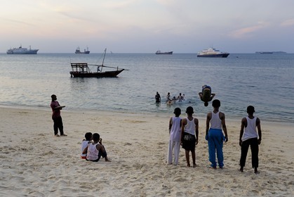 Tanzania, Zanzibar Archipelago, Unguja island (Zanzibar), Stone Town, listed as World Heritage by UNESCO, acrobatics on the beach