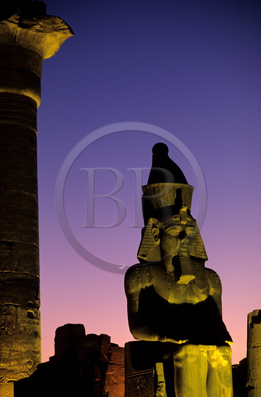 Egypt, Luxor, Luxor temple, the colossal statue of Ramses II at the entrance of the 2nd pylon