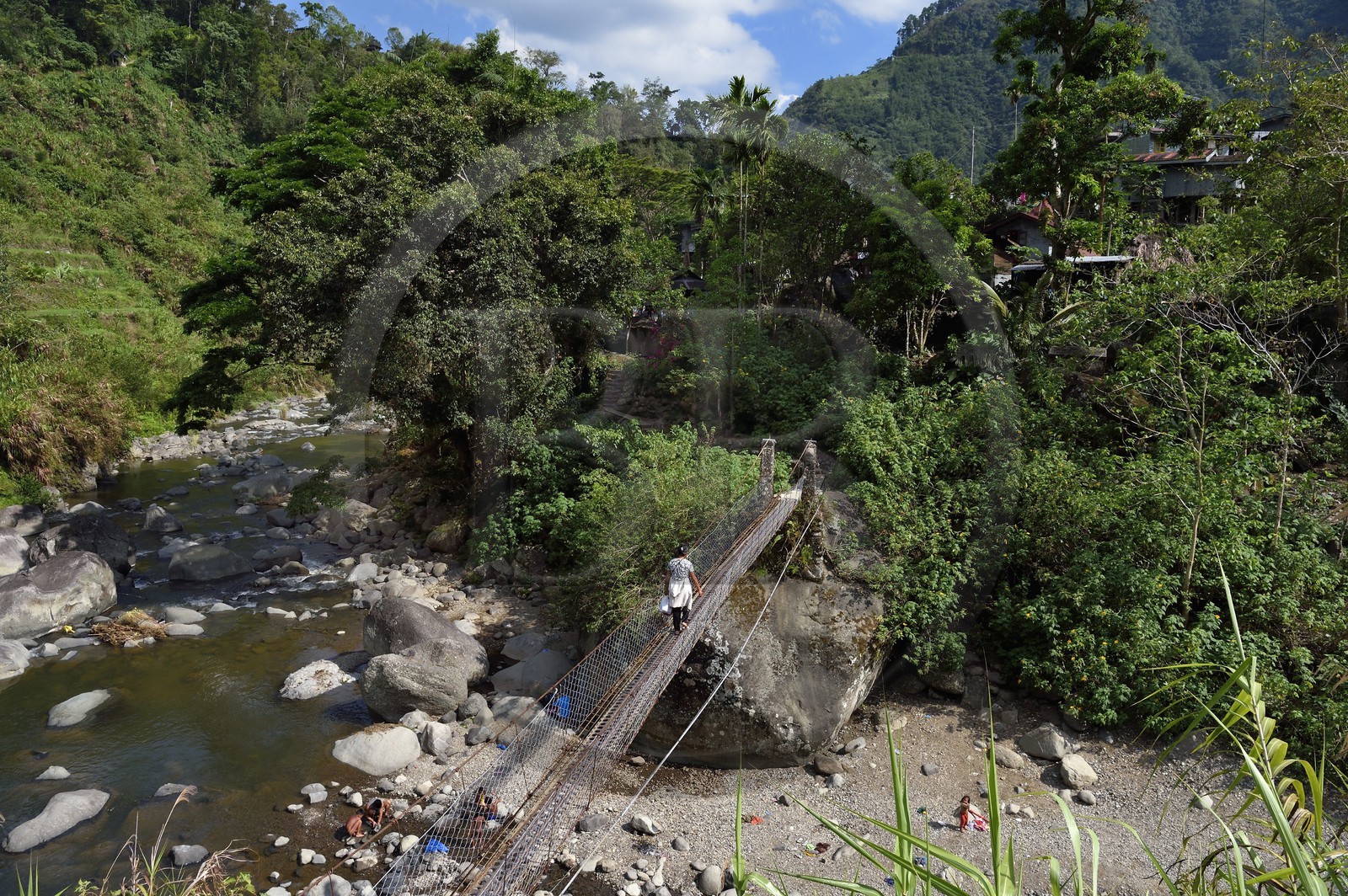 Philippines, Ifugao province, Banaue region, suspension bridge that leads to the village of Cambulo