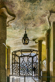 Spain, Catalonia, Barcelona, Eixample district, Passeig de Gracia, Pedrera or Casa Mila (1905-1910) by the Catalan modernist architect Antoni Gaudi, UNESCO World Heritage site, frescoes and columns of the main entrance