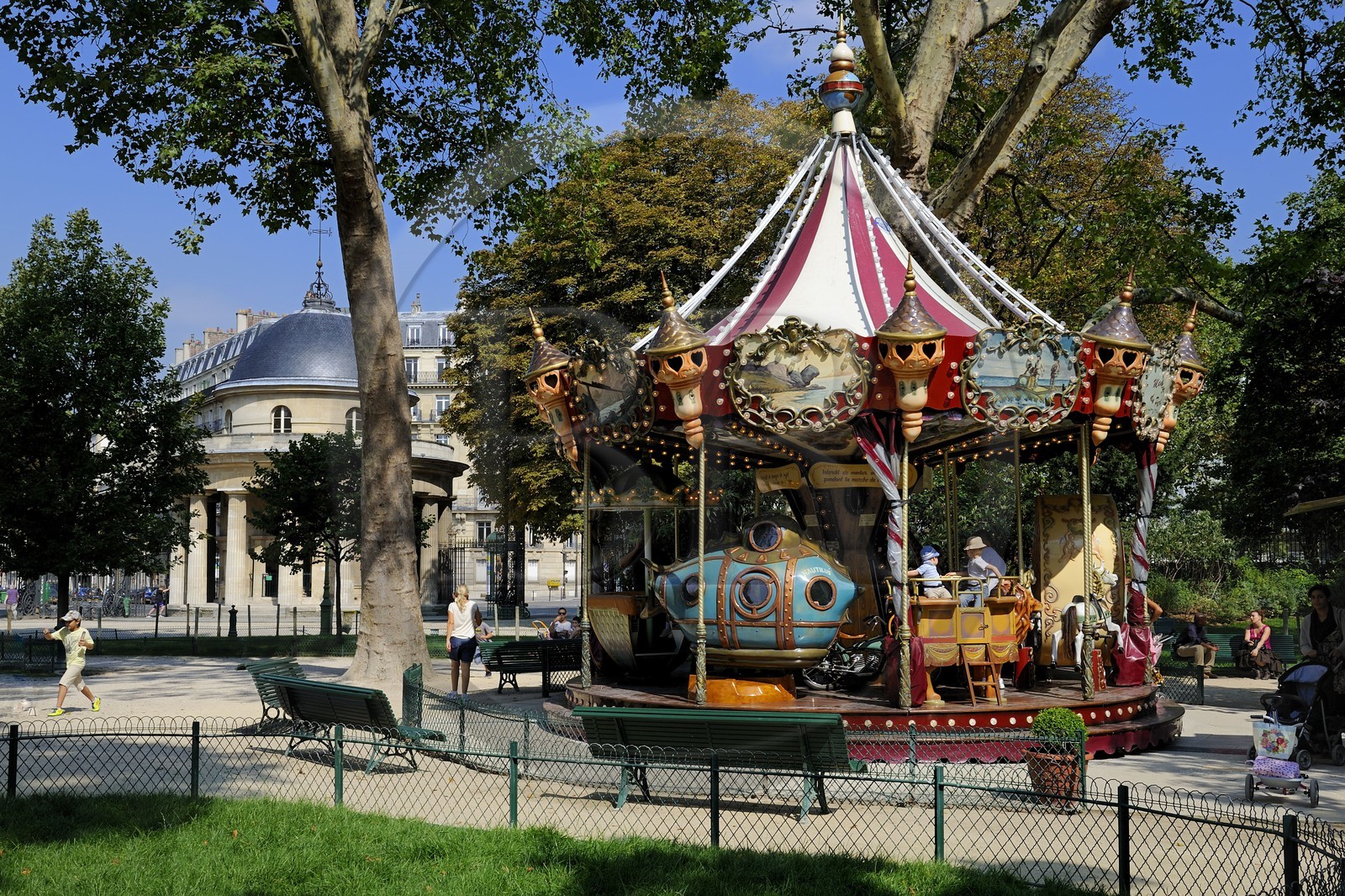 France, Paris, Monceau Park, the Jules Verne carousel and the rotunda part of the Wall of the Farmers-General built by Claude Nicolas Ledoux