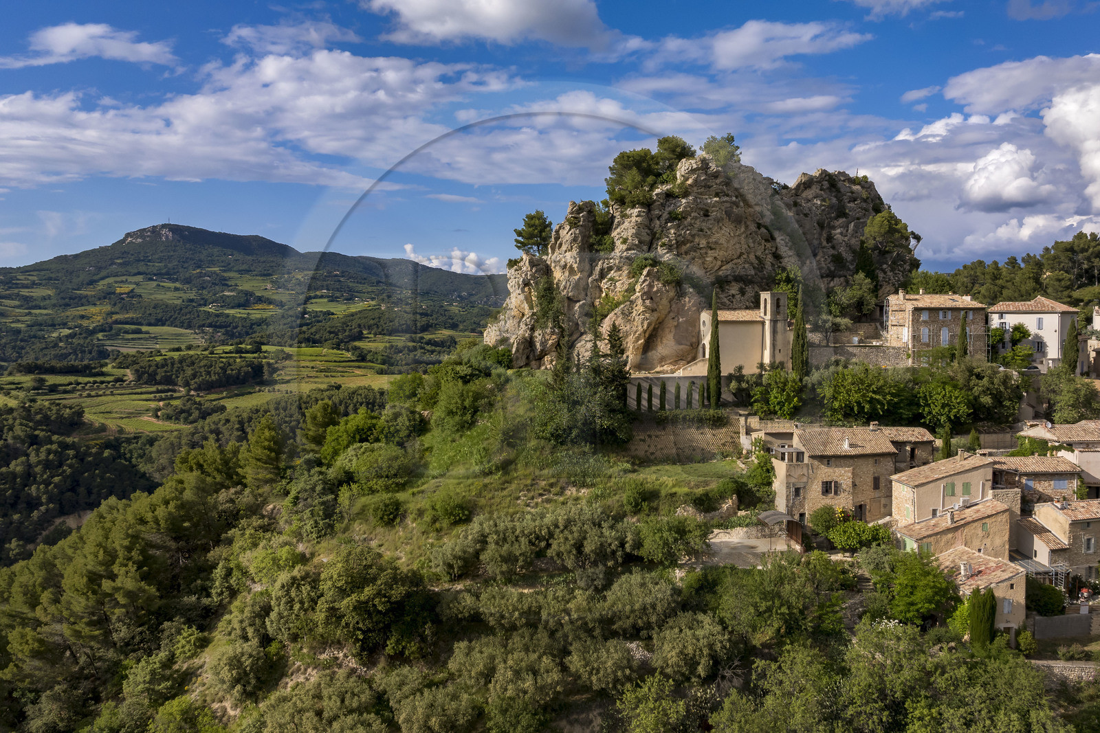 France, Vaucluse, Dentelles de Montmirail mountains, the hilltop village of La Roque-Alric and the summit of the Saint Amand ridge in the background (aerial view)