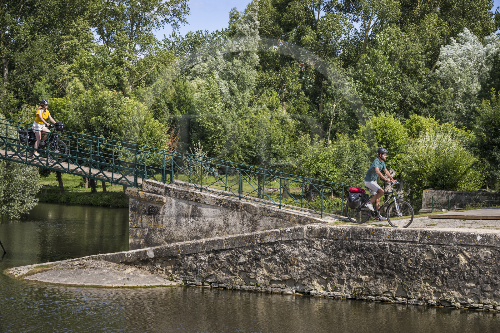 France, Deux-Sèvres, le Marais Poitevin, Green Venice, Le Vanneau-Irleau, bicycle journey along the canals and crossing a footbridge