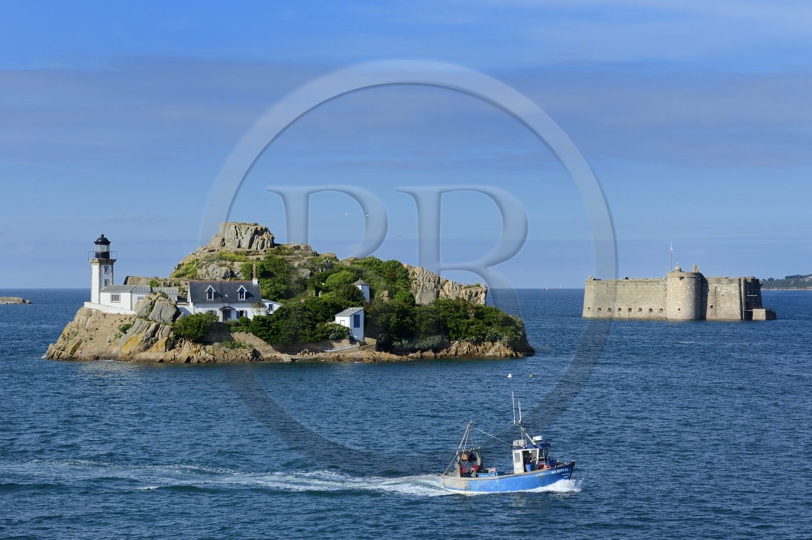 France, Finistere, Morlaix bay, Carantec, lighthouse of Louet island (also a guest house in summer) and the Chateau du Taureau