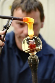 France, Moselle, Saint-Louis-les-Bitche, the Cristallerie Saint-Louis (Saint-Louis crystal glass manufacturer), shaping a hot crystal element, one of the many steps of the realization of a paperweight