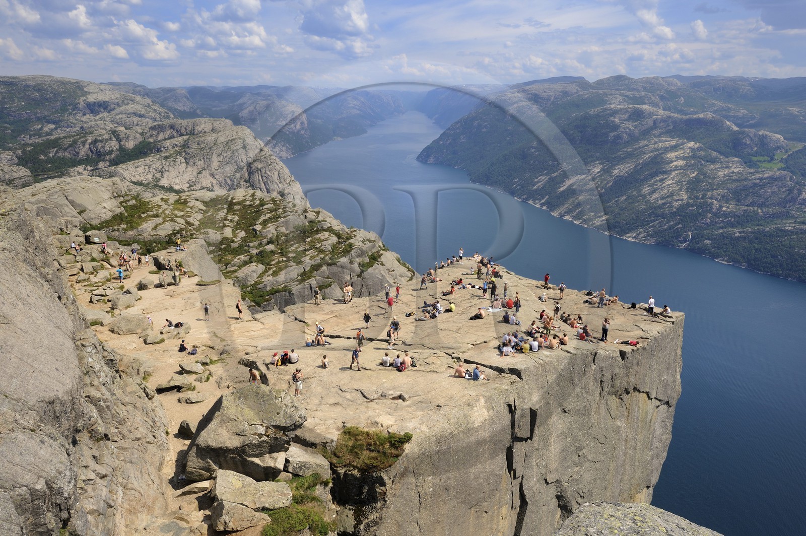 Norway, Rogaland County, Lysebotn Fjord, hikers in Preikestolen Rock at 600m above the Lysefjord