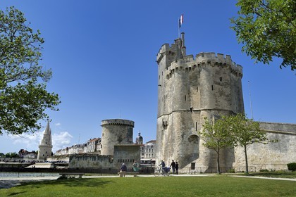France, Charente-Maritime, La Rochelle, the Old Port, Tour de la Chaine left and Tour Saint Nicolas right protect the entrance to the Old Port, the tour de la Lanterne in the background