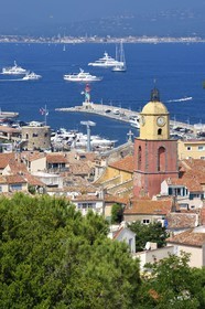 France, Var, Saint-Tropez, Notre Dame de l'Assomption parish church seen from the citadel, Grimaud in the background