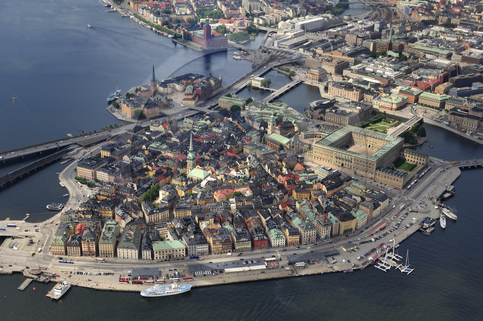 Sweden, Stockholm, Gamla Stan island (old town), the Royal Palace right and behind it the Parliament (aerial view)