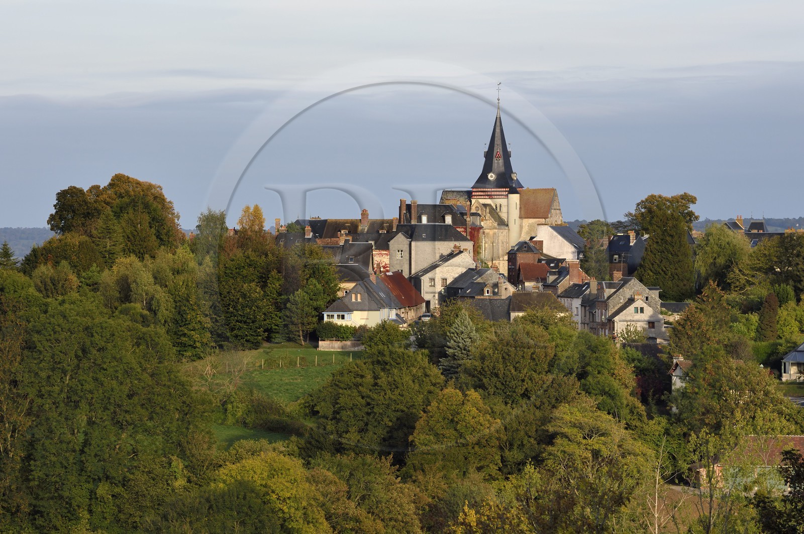 France, Calvados, Pays d'Auge, Beaumont en Auge and Saint Sauveur (St. Saviour) Church overlooking the village