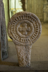 France, Aveyron, Causses and the Cévennes, cultural landscape of Mediterranean agro-pastoralism, listed as World Heritage by UNESCO, La Couvertoirade, labelled Les Plus Beaux Villages de France (The Most Beautiful Villages of France), fortified village on the Larzac plateau, Saint-Christol church, discoidal tombstone, cross medieval stele discovered on the Larzac