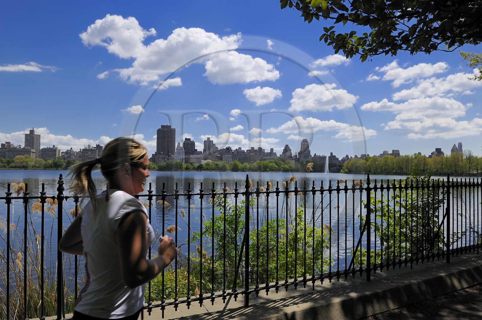 United States, New York City, Manhattan, Central Park, jogging around the Reservoir surrounded by skyscrapers