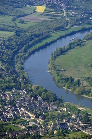 France, Val d'Oise, the village of Vetheuil is nestled in a loop of the Seine river and Notre Dame church painted by Claude Monet (aerial view)