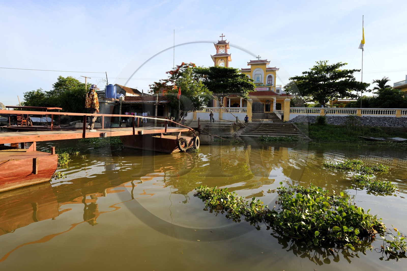Vietnam, Ninh Binh province, insular village of Kenh Ga, the church is central in this very catholic region, the only access bridge to the village