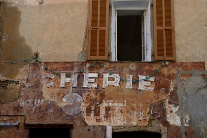 France, Haute Corse, Castagniccia, village of La Porta, former butcher in the main street